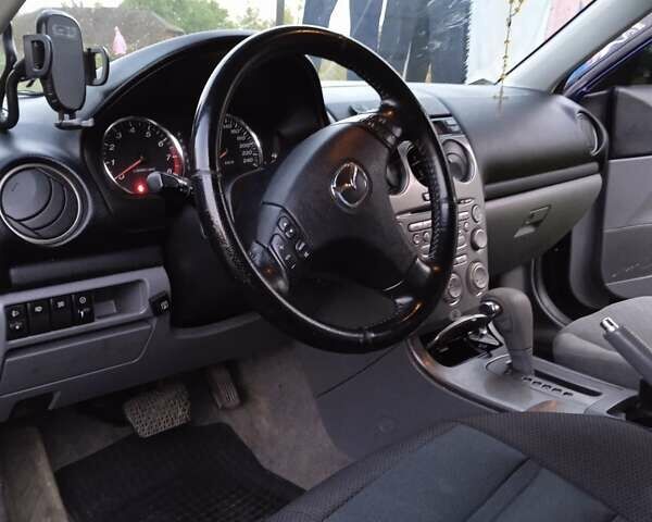 Синий Мазда 6, объемом двигателя 2 л и пробегом 218 тыс. км за 3800 $, фото 5 на Automoto.ua