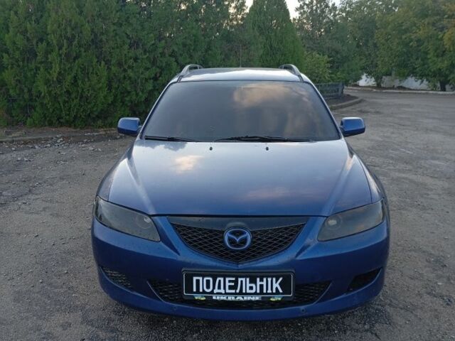Синий Мазда 6, объемом двигателя 2 л и пробегом 377 тыс. км за 1950 $, фото 4 на Automoto.ua