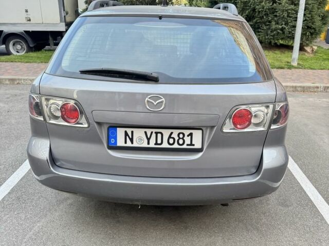 Синий Мазда 6, объемом двигателя 2 л и пробегом 233 тыс. км за 1350 $, фото 5 на Automoto.ua