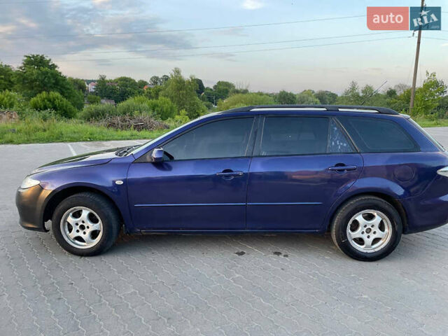 Синий Мазда 6, объемом двигателя 2 л и пробегом 243 тыс. км за 2399 $, фото 11 на Automoto.ua