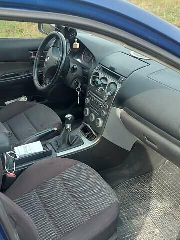 Синий Мазда 6, объемом двигателя 2 л и пробегом 340 тыс. км за 3000 $, фото 3 на Automoto.ua