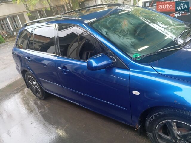 Синій Мазда 6, об'ємом двигуна 2 л та пробігом 240 тис. км за 4000 $, фото 2 на Automoto.ua