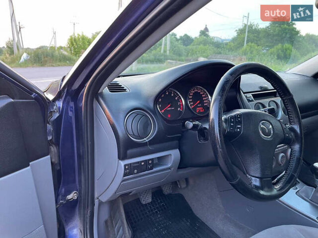 Синий Мазда 6, объемом двигателя 2 л и пробегом 243 тыс. км за 2399 $, фото 15 на Automoto.ua