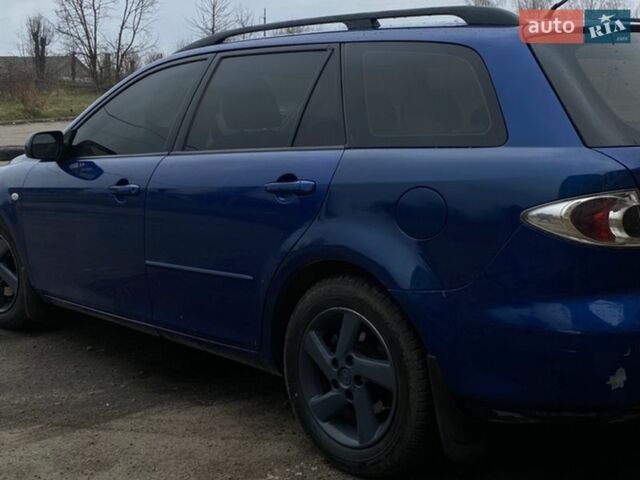 Синий Мазда 6, объемом двигателя 2 л и пробегом 323 тыс. км за 3900 $, фото 3 на Automoto.ua