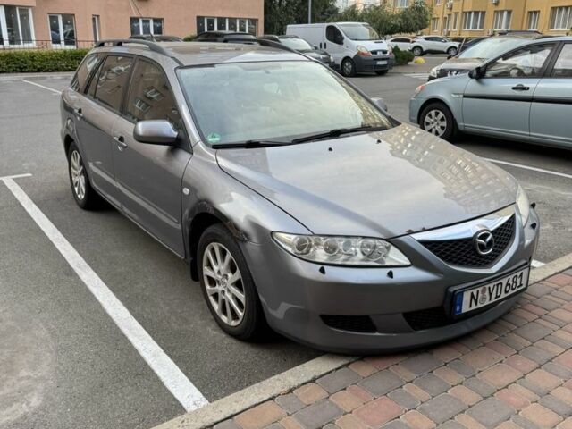 Синий Мазда 6, объемом двигателя 2 л и пробегом 233 тыс. км за 1350 $, фото 2 на Automoto.ua