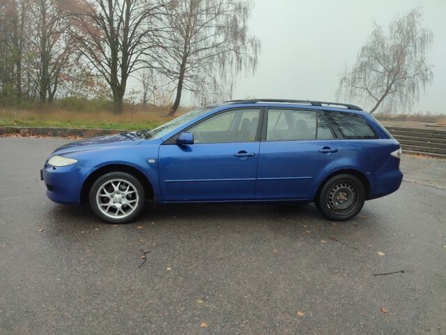 Синій Мазда 6, об'ємом двигуна 2 л та пробігом 220 тис. км за 1200 $, фото 1 на Automoto.ua