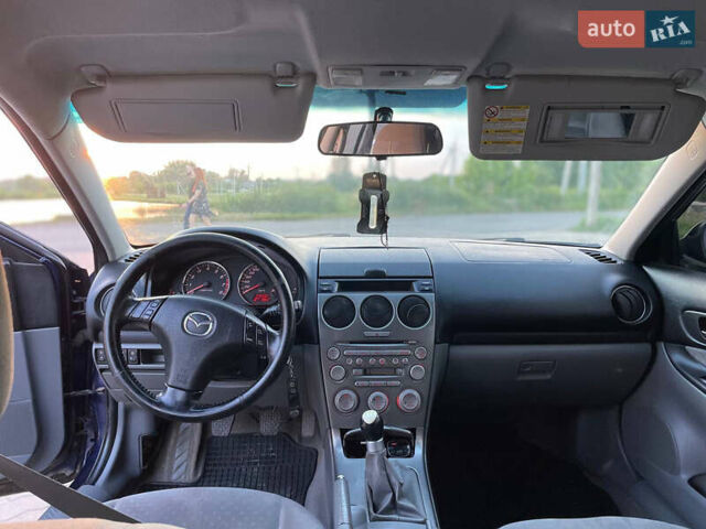 Синий Мазда 6, объемом двигателя 2 л и пробегом 243 тыс. км за 2399 $, фото 16 на Automoto.ua
