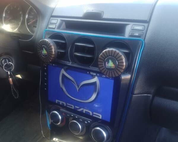 Синий Мазда 6, объемом двигателя 1.8 л и пробегом 235 тыс. км за 3800 $, фото 5 на Automoto.ua