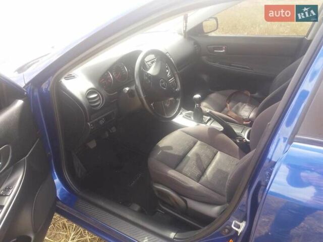 Синий Мазда 6, объемом двигателя 1.8 л и пробегом 226 тыс. км за 4400 $, фото 2 на Automoto.ua