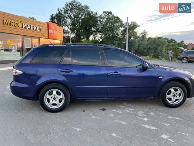 Синий Мазда 6, объемом двигателя 2 л и пробегом 243 тыс. км за 2399 $, фото 7 на Automoto.ua