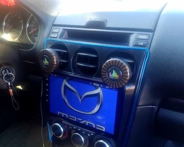Синій Мазда 6, об'ємом двигуна 1.8 л та пробігом 245 тис. км за 4450 $, фото 1 на Automoto.ua