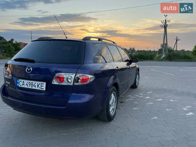 Синий Мазда 6, объемом двигателя 2 л и пробегом 243 тыс. км за 2399 $, фото 6 на Automoto.ua