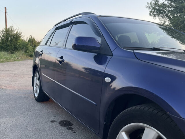 Синій Мазда 6, об'ємом двигуна 2 л та пробігом 278 тис. км за 5800 $, фото 5 на Automoto.ua