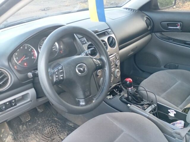 Синий Мазда 6, объемом двигателя 2 л и пробегом 377 тыс. км за 1950 $, фото 5 на Automoto.ua