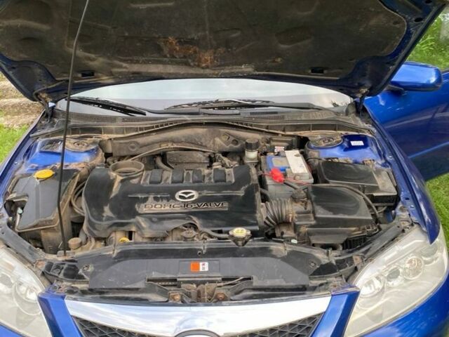 Синий Мазда 6, объемом двигателя 2 л и пробегом 230 тыс. км за 2360 $, фото 2 на Automoto.ua