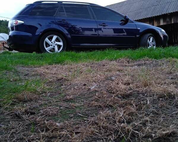 Синий Мазда 6, объемом двигателя 2 л и пробегом 218 тыс. км за 3800 $, фото 9 на Automoto.ua