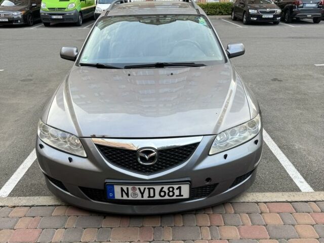 Синий Мазда 6, объемом двигателя 2 л и пробегом 233 тыс. км за 1350 $, фото 1 на Automoto.ua