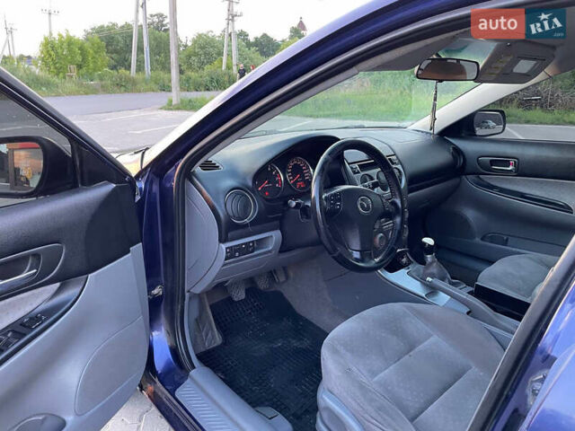 Синий Мазда 6, объемом двигателя 2 л и пробегом 243 тыс. км за 2399 $, фото 17 на Automoto.ua