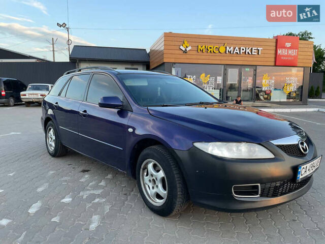 Синий Мазда 6, объемом двигателя 2 л и пробегом 243 тыс. км за 2399 $, фото 9 на Automoto.ua