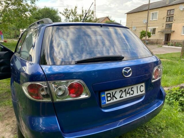 Синий Мазда 6, объемом двигателя 2 л и пробегом 230 тыс. км за 2360 $, фото 7 на Automoto.ua