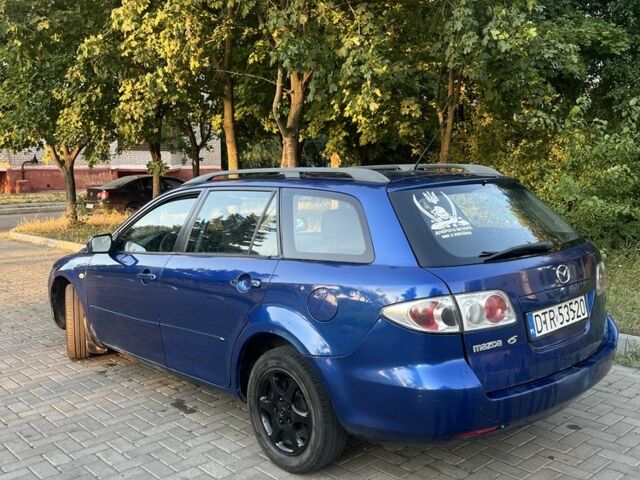 Синий Мазда 6, объемом двигателя 2 л и пробегом 260 тыс. км за 1000 $, фото 1 на Automoto.ua