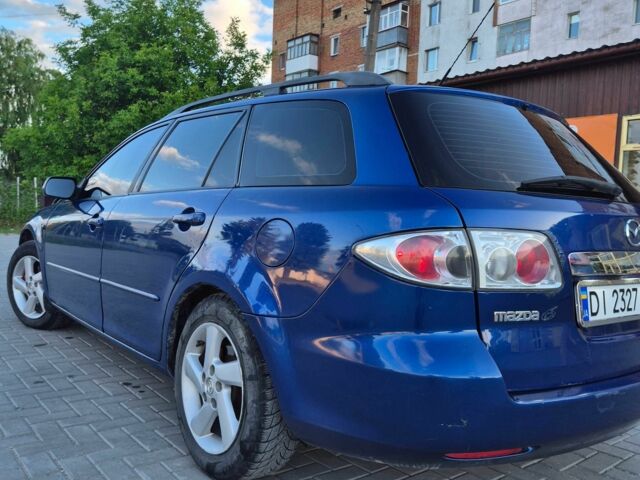 Синий Мазда 6, объемом двигателя 2 л и пробегом 408 тыс. км за 3099 $, фото 9 на Automoto.ua