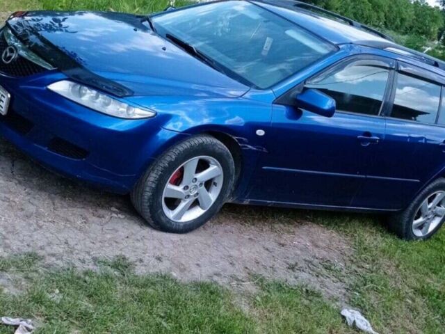 Синий Мазда 6, объемом двигателя 2 л и пробегом 255 тыс. км за 4200 $, фото 2 на Automoto.ua