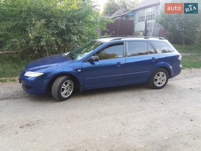 Синий Мазда 6, объемом двигателя 1.8 л и пробегом 226 тыс. км за 4400 $, фото 12 на Automoto.ua