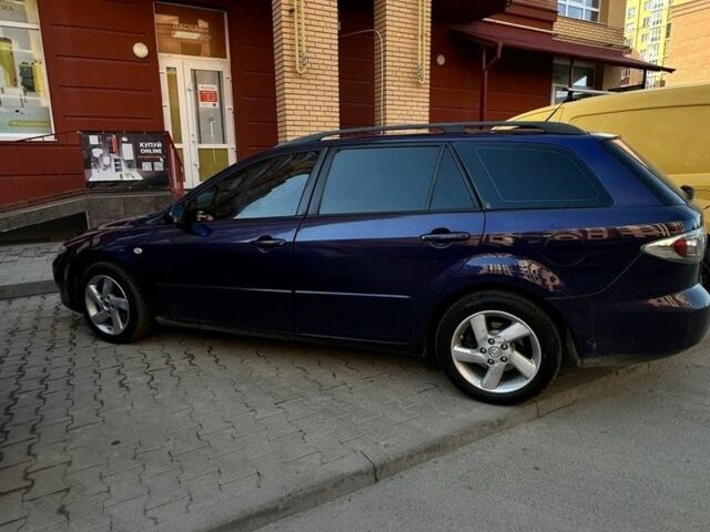 Синий Мазда 6, объемом двигателя 2 л и пробегом 301 тыс. км за 3700 $, фото 1 на Automoto.ua