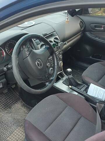 Синий Мазда 6, объемом двигателя 2 л и пробегом 340 тыс. км за 3000 $, фото 2 на Automoto.ua