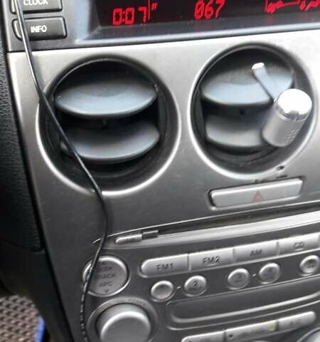 Синий Мазда 6, объемом двигателя 2 л и пробегом 220 тыс. км за 3800 $, фото 5 на Automoto.ua