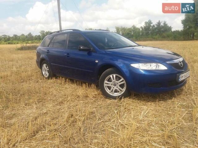 Синий Мазда 6, объемом двигателя 1.8 л и пробегом 226 тыс. км за 4400 $, фото 6 на Automoto.ua