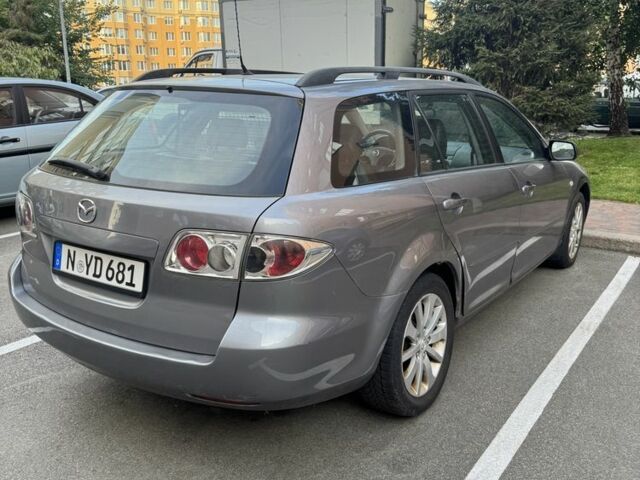 Синий Мазда 6, объемом двигателя 2 л и пробегом 233 тыс. км за 1350 $, фото 4 на Automoto.ua