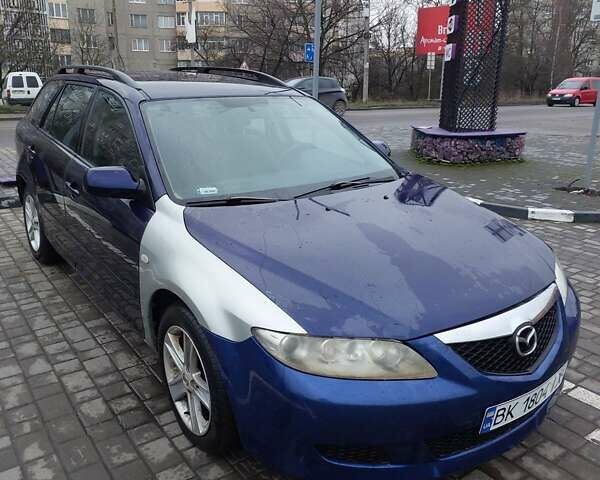 Синій Мазда 6, об'ємом двигуна 2 л та пробігом 230 тис. км за 1777 $, фото 6 на Automoto.ua