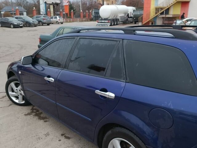 Синій Мазда 6, об'ємом двигуна 2 л та пробігом 297 тис. км за 2400 $, фото 3 на Automoto.ua