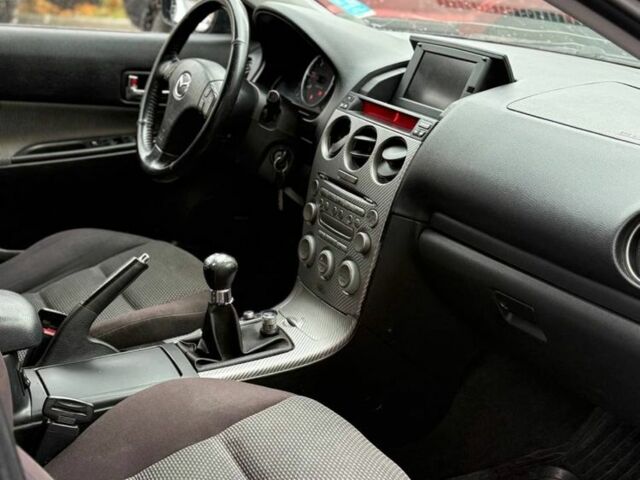 Синий Мазда 6, объемом двигателя 2 л и пробегом 221 тыс. км за 1800 $, фото 5 на Automoto.ua