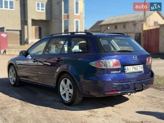 Синий Мазда 6, объемом двигателя 1.8 л и пробегом 231 тыс. км за 3800 $, фото 12 на Automoto.ua