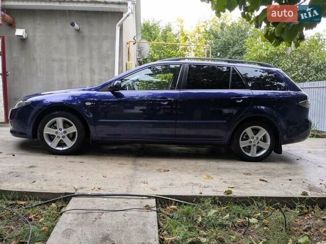 Синій Мазда 6, об'ємом двигуна 1.8 л та пробігом 216 тис. км за 5500 $, фото 5 на Automoto.ua