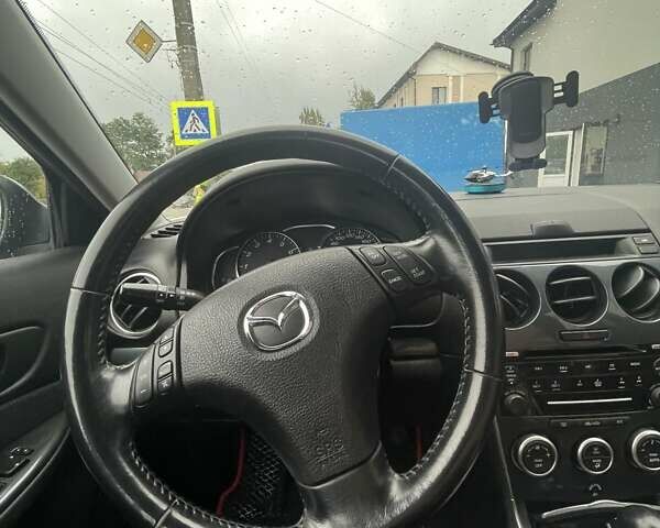 Синій Мазда 6, об'ємом двигуна 2 л та пробігом 195 тис. км за 6300 $, фото 23 на Automoto.ua