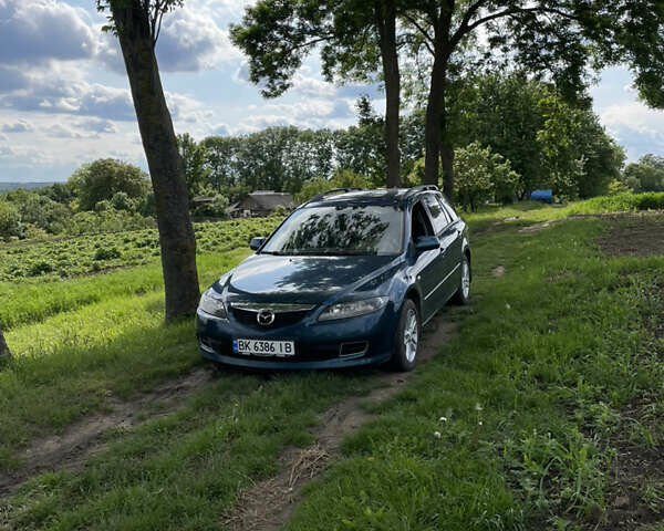 Синий Мазда 6, объемом двигателя 2 л и пробегом 310 тыс. км за 4200 $, фото 3 на Automoto.ua