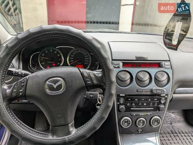 Синій Мазда 6, об'ємом двигуна 1.8 л та пробігом 216 тис. км за 5500 $, фото 4 на Automoto.ua