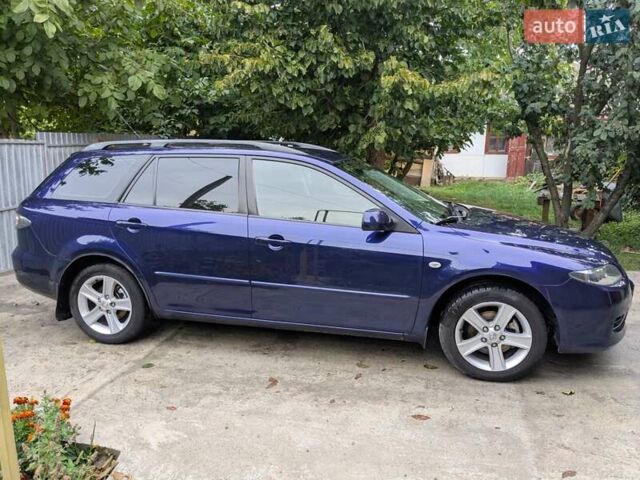 Синій Мазда 6, об'ємом двигуна 1.8 л та пробігом 216 тис. км за 5500 $, фото 7 на Automoto.ua