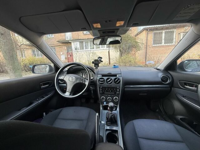 Синій Мазда 6, об'ємом двигуна 1.8 л та пробігом 201 тис. км за 2100 $, фото 6 на Automoto.ua