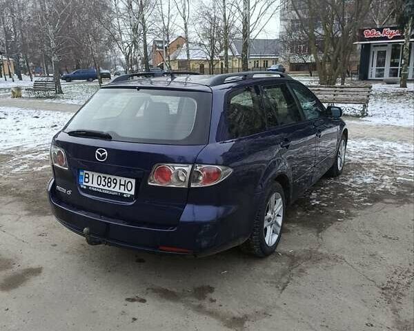 Синий Мазда 6, объемом двигателя 2 л и пробегом 217 тыс. км за 3950 $, фото 4 на Automoto.ua