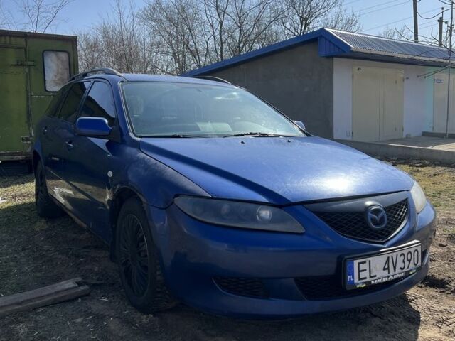 Синий Мазда 6, объемом двигателя 2 л и пробегом 300 тыс. км за 550 $, фото 6 на Automoto.ua
