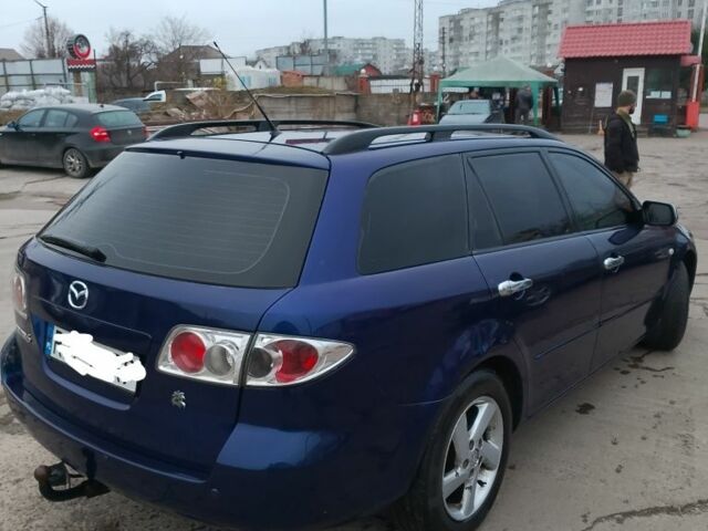 Синій Мазда 6, об'ємом двигуна 2 л та пробігом 297 тис. км за 2400 $, фото 2 на Automoto.ua