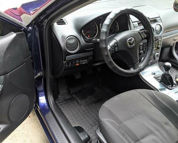 Синій Мазда 6, об'ємом двигуна 1.8 л та пробігом 216 тис. км за 5500 $, фото 3 на Automoto.ua