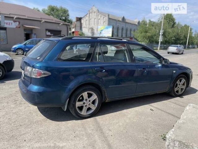 Синий Мазда 6, объемом двигателя 1.8 л и пробегом 330 тыс. км за 2700 $, фото 5 на Automoto.ua