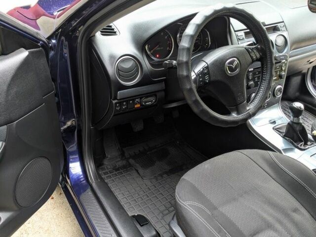 Синий Мазда 6, объемом двигателя 1.8 л и пробегом 216 тыс. км за 5500 $, фото 7 на Automoto.ua