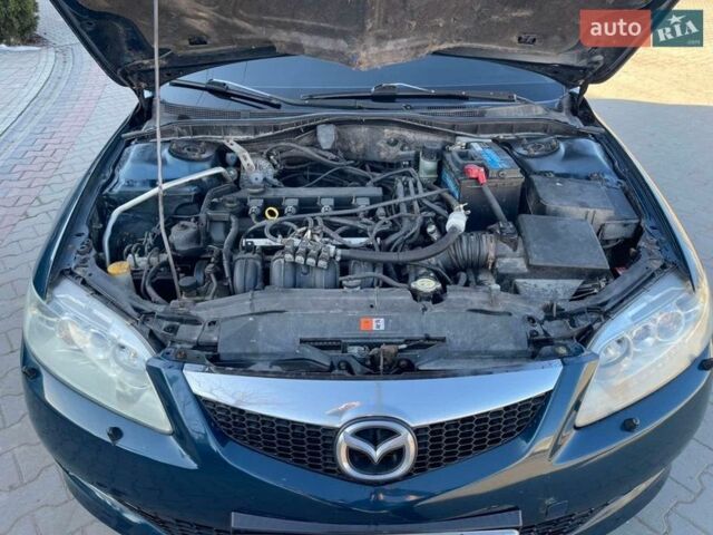Синій Мазда 6, об'ємом двигуна 2 л та пробігом 252 тис. км за 3400 $, фото 18 на Automoto.ua